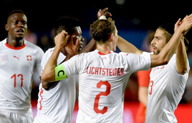 Switzerland celebrate a goal against Spain